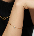 Gold bracelet with a heart charm