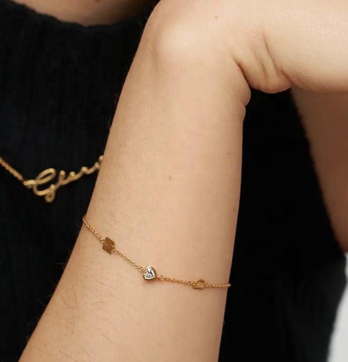 Gold bracelet with a heart charm