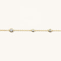 Gold link bracelet with small diamonds