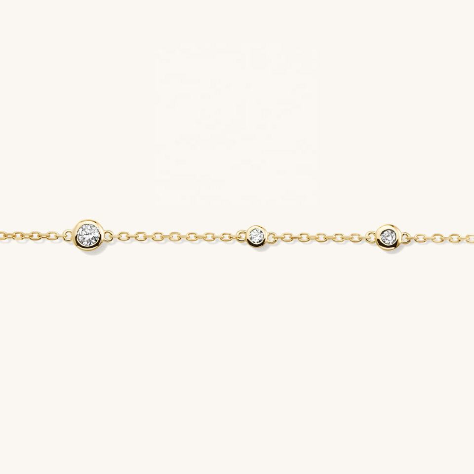 Gold link bracelet with small diamonds